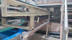 What are the functions of a belt type quantitative weighing feeder in metallurgical production operations?